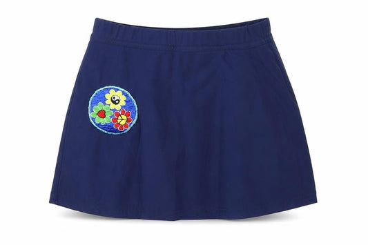 Front view of TEAM COLOURS women’s blue skort, size UK 24, in - shorts underneath netball sport