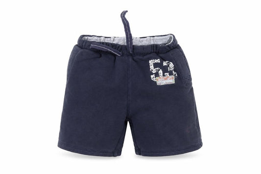 Front view of Next girls’ blue sweat shorts, size 4-5, years