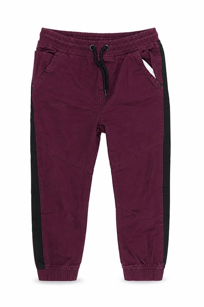 Front view of Tu girls’ purple tapered jeans, size 9, months
