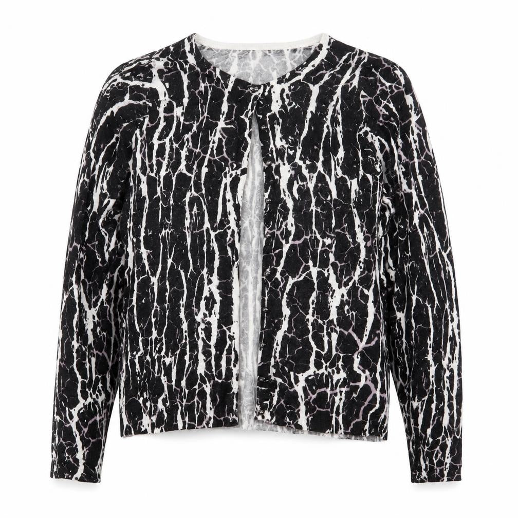 Front view of Marks & Spencer women’s black geometric knit cape jumper, size UK 10