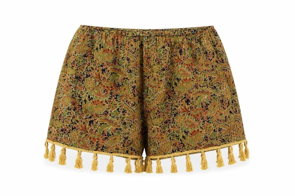 Front view of Boohoo women’s green cut-off shorts, size UK 8