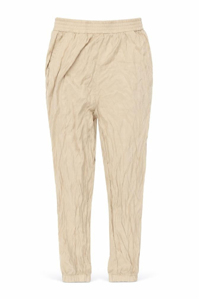 Front view of SHEIN women’s beige trousers, size XS, 25-inch leg