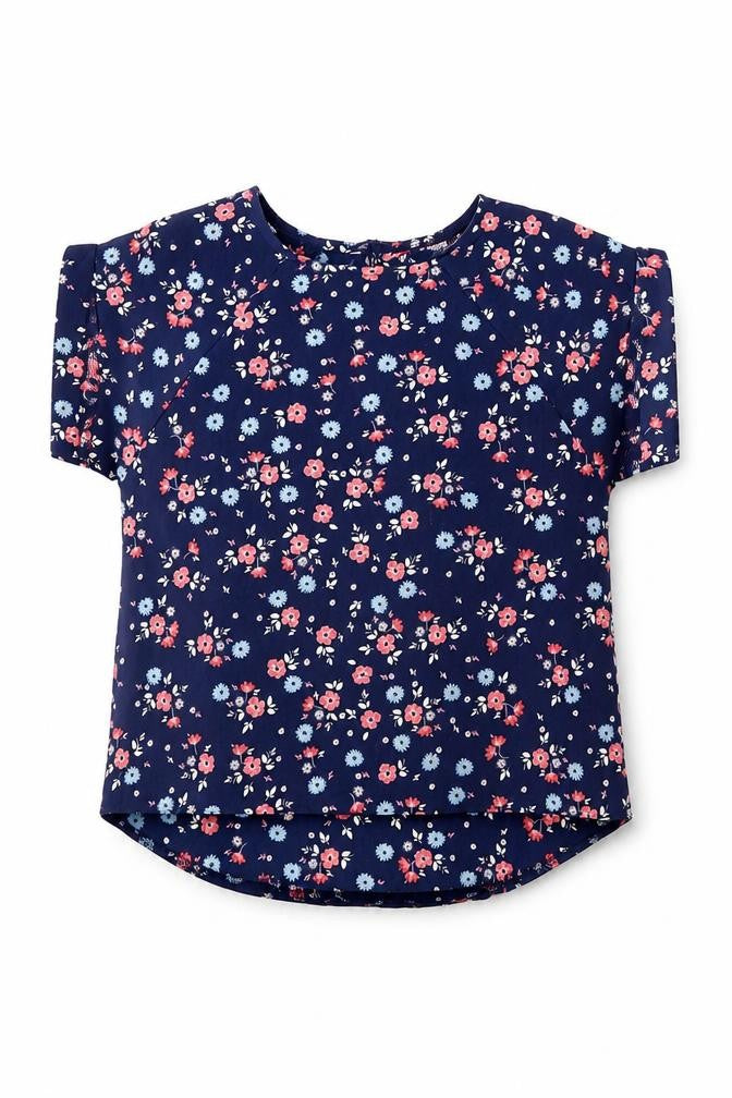 Front view of Young Dimension girls’ blue floral basic blouse, size 7, years