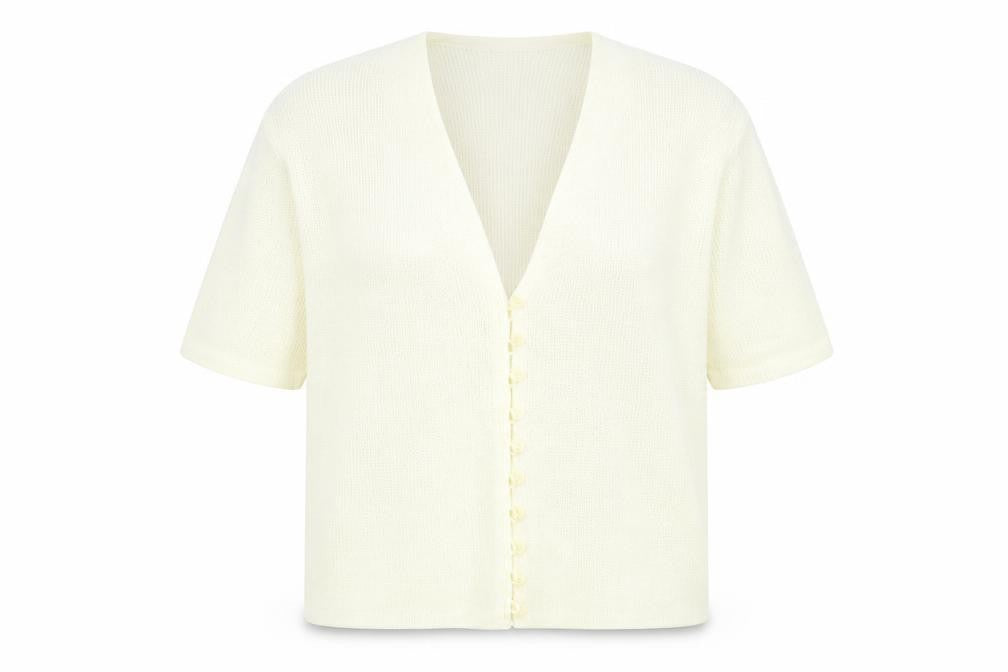 Front view of Canda women’s beige knit cardigan jumper, size M
