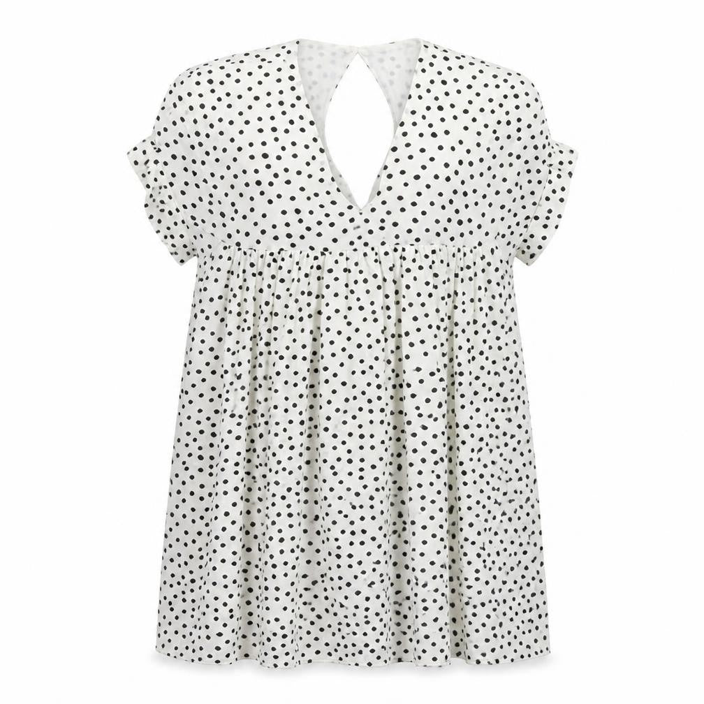 Front view of Kilky women’s white polka dot mini, size M