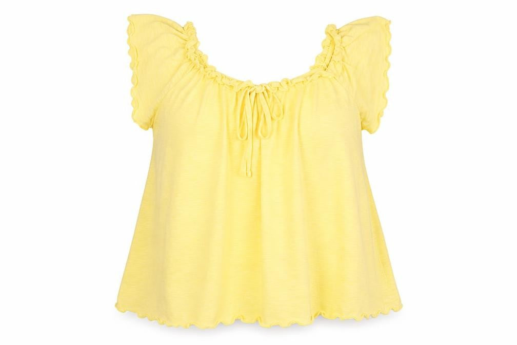 Front view of Primark women’s yellow polo, size UK 10