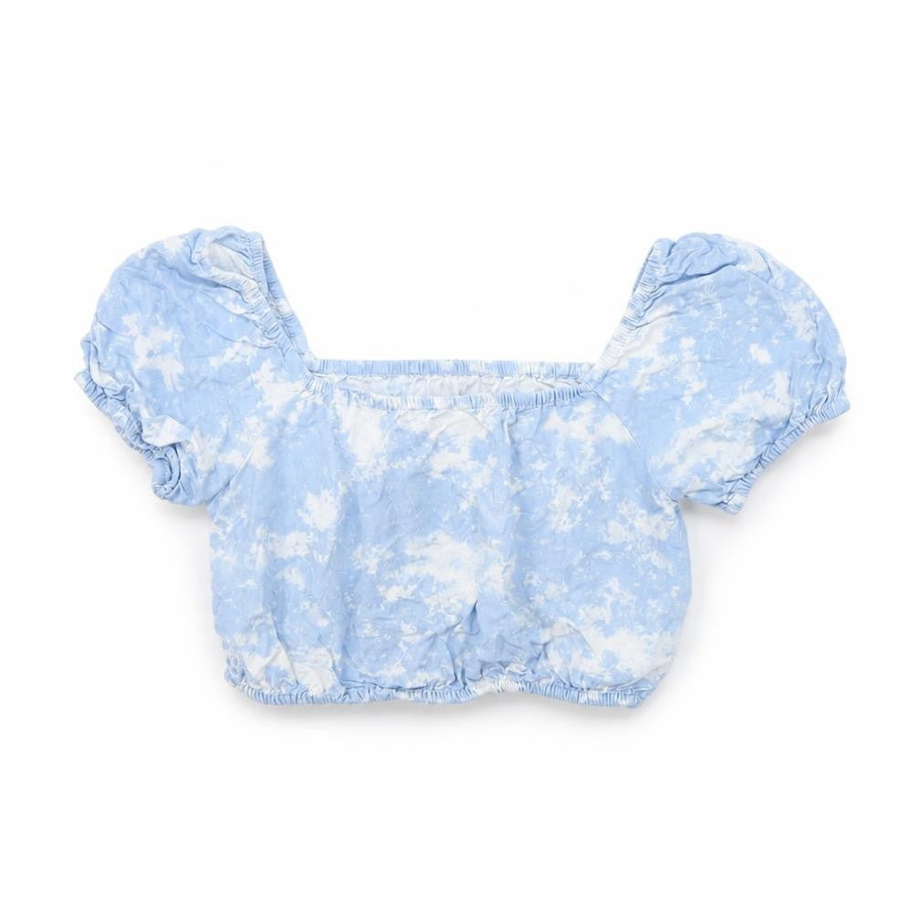 Front view of New Look girls’ blue geometric basic blouse, size 10, years