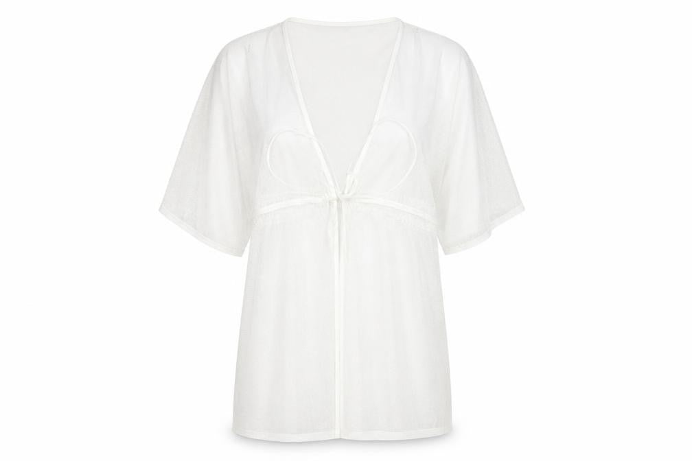 Front view of Primark women’s white cardigan jumper, size UK 12