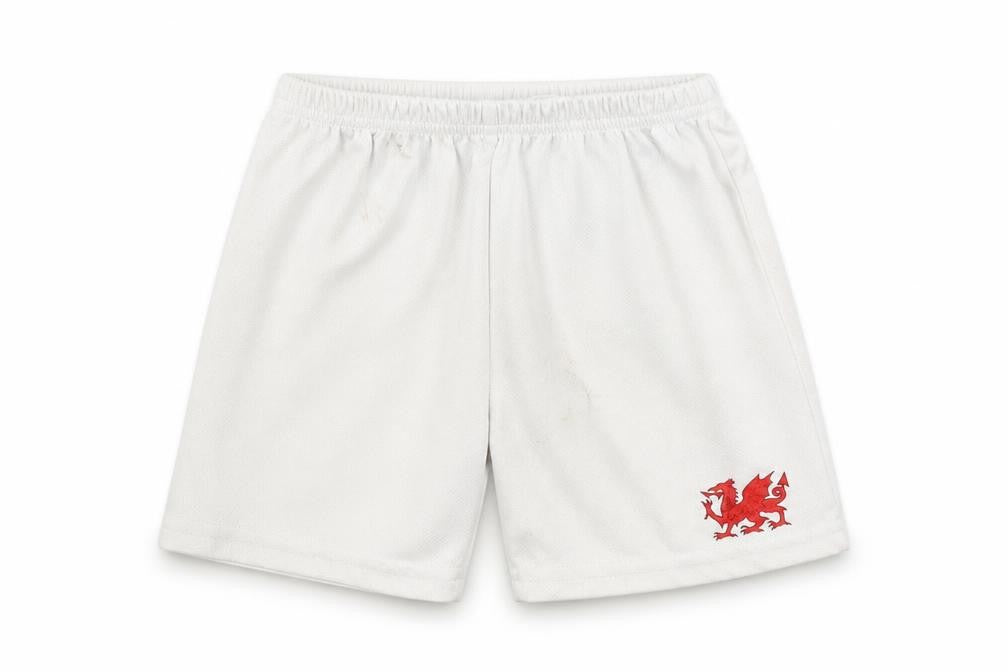 Front view of Manav boys’ white bermuda shorts, size 4, years