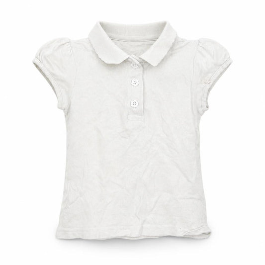 Front view of Matalan girls’ white basic polo, size 5, years
