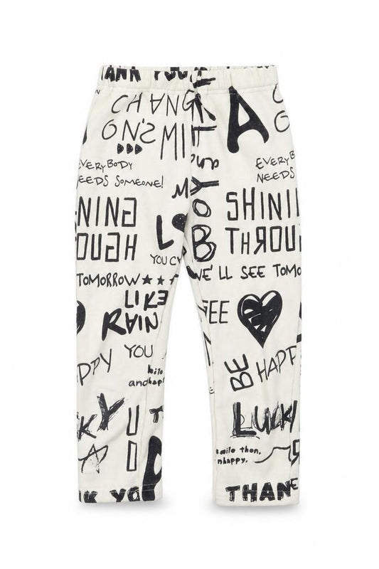 Front view of Preworn girls’ white geometric sweatpants, size 7, years