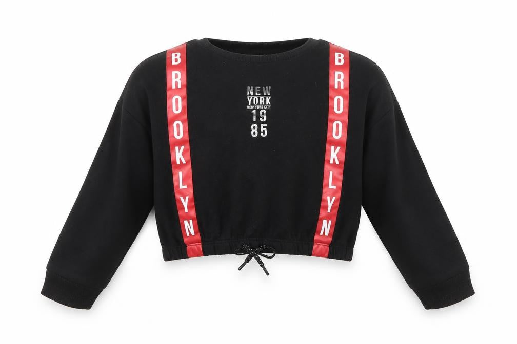 Front view of Primark girls’ black jumper, size 8-9, years