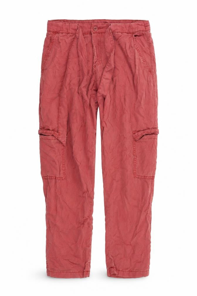 Front view of Primark women’s red trousers, size UK 8, 25-inch leg