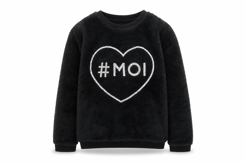 Front view of H&M girls’ black geometric jumper, size 9-10, years