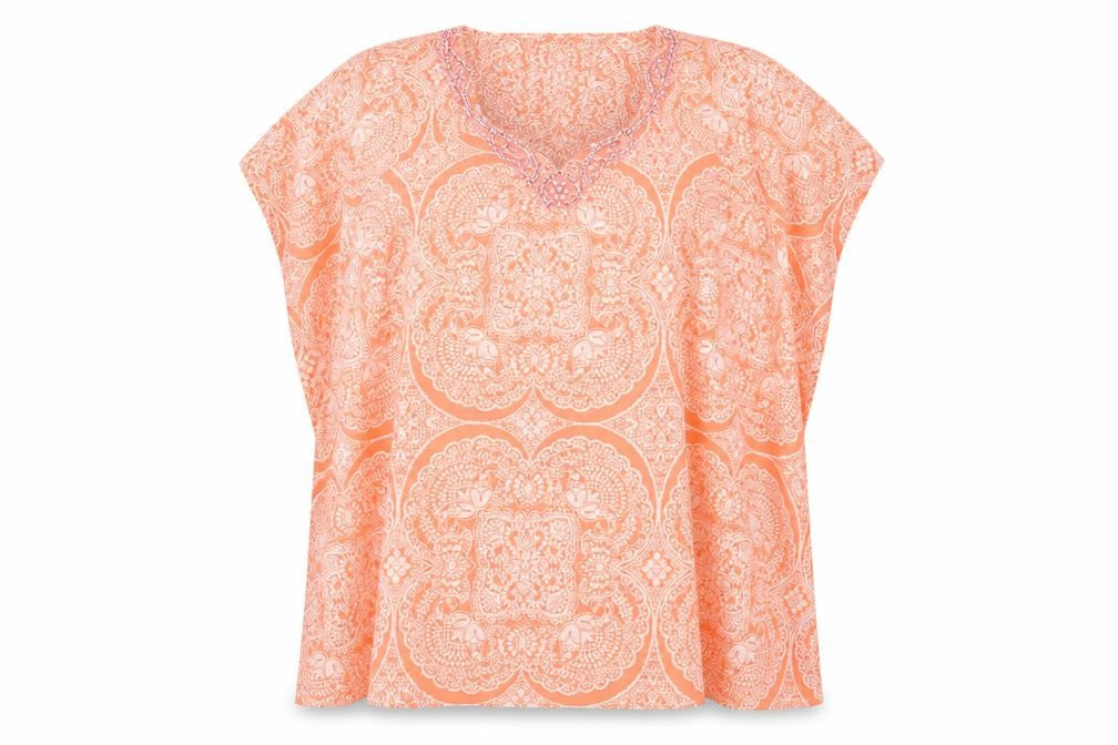 Front view of Peppermint women’s orange fair isle poncho, size M