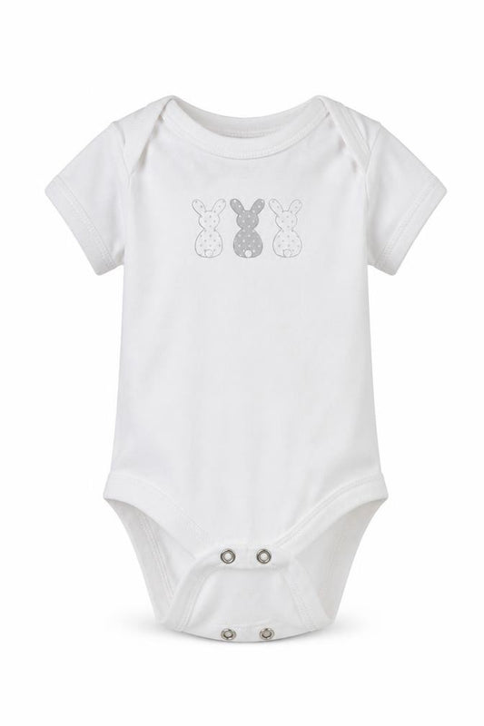 Front view of Matalan girls’ white leotard one-piece, size 3-6, months