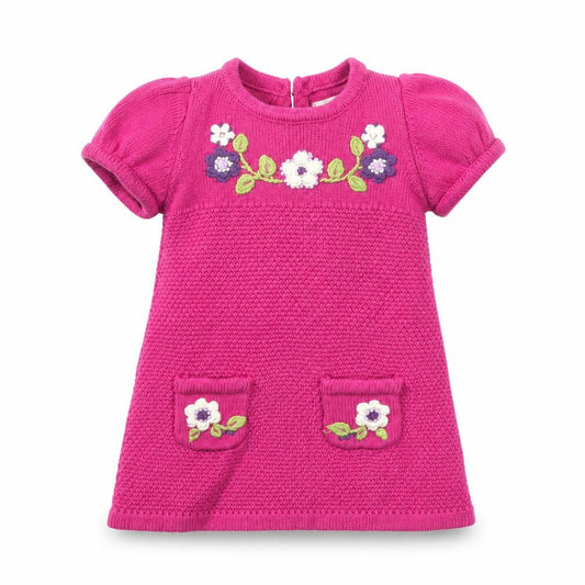 Front view of HEIRLOOM girls’ pink geometric jumper dress, size 12, months