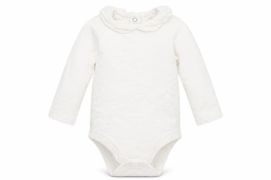 Front view of Tu girls’ white babygrow one-piece, size 3-6, months