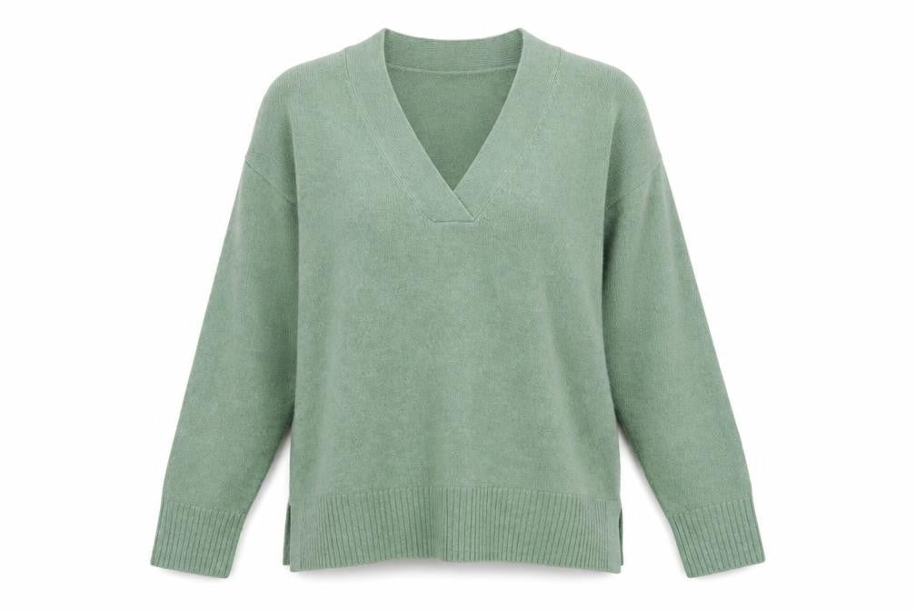 Front view of Nutmeg women’s green pullover sweatshirt, size UK 12