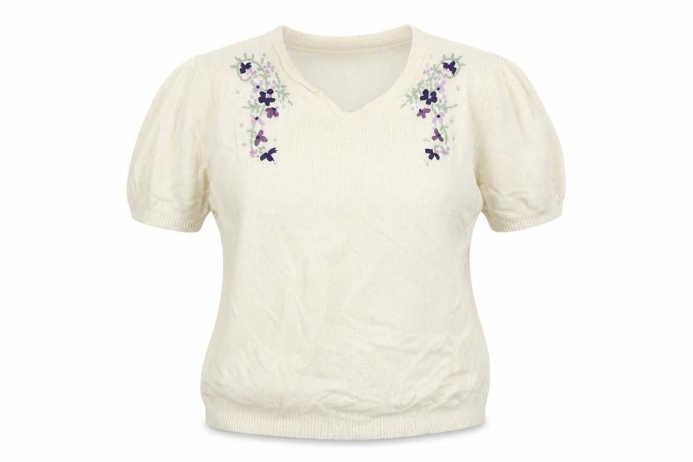 Front view of EWM women’s white jumper, size UK 18
