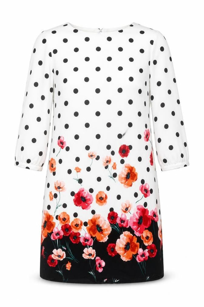 Front view of women’s white polka dot shift, size UK 10