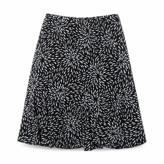 Front view of Preworn women’s black geometric flare skirt, size UK 34, in