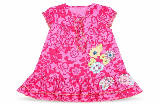 Front view of Indigo girls’ pink floral a-line, size 18-24, months - frilled hem