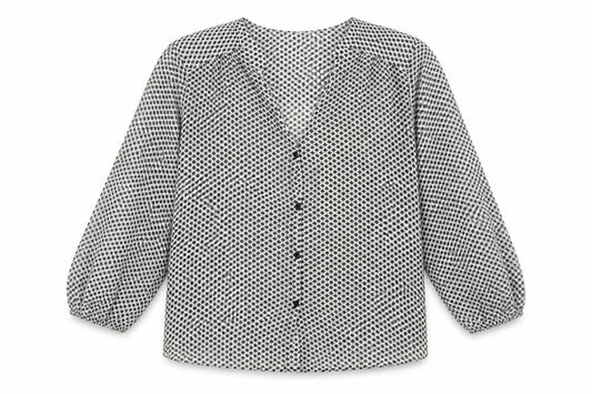 Front view of H&M women’s multicoloured polka dot basic blouse, size UK 8