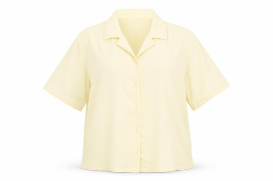 Front view of Damart women’s yellow polyester basic button-up, size UK 18, collared