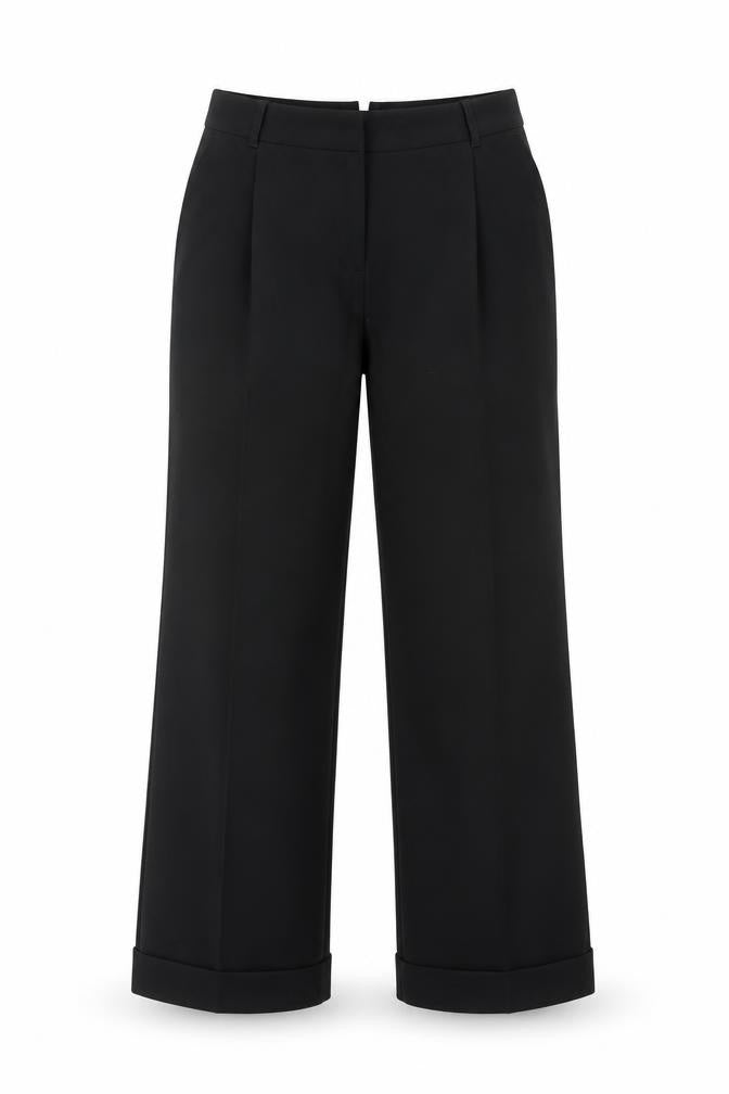 Front view of Next women’s black polyester trousers, size UK 8, 29-inch leg regular