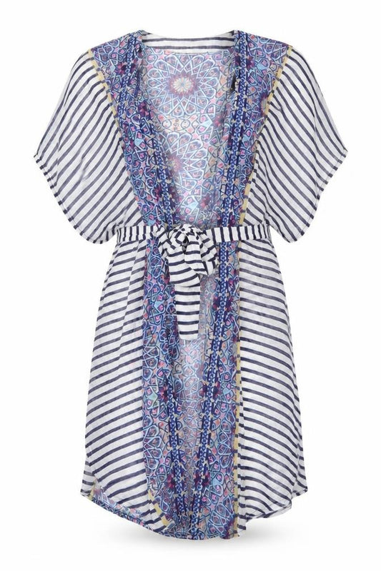 Front view of Warehouse women’s blue geometric polyester wrap dress, size M, v-neck - beach wrap