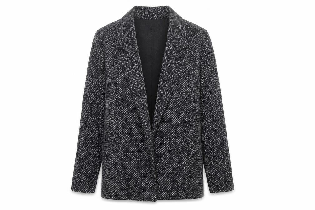 Front view of River Island women’s black polka dot jacket, size UK 10