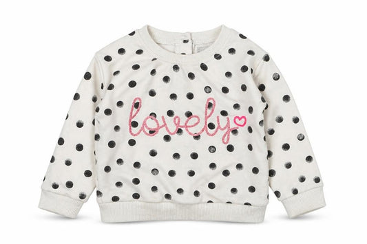 Front view of Primark girls’ multicoloured polka dot cotton jumper, size 6-9, months