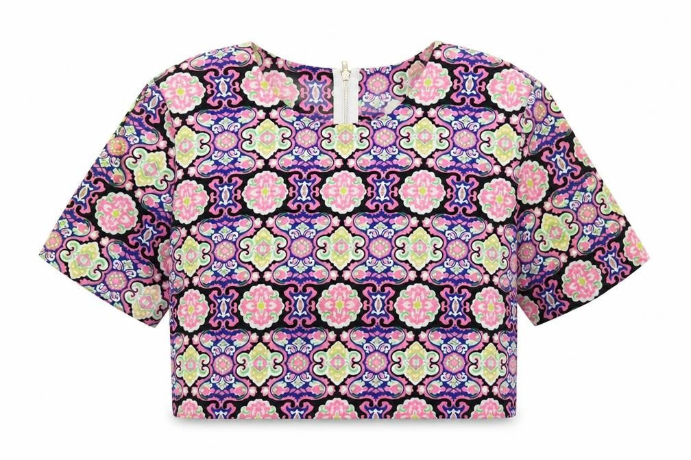 Front view of Urmoda women’s multicoloured geometric polyester cropped blouse, size UK 10, round neck