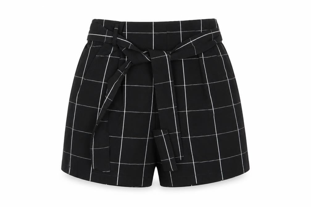 Front view of Pull&Bear women’s multicoloured check vinyl cut-off shorts, size UK 26, 6-inch leg regular