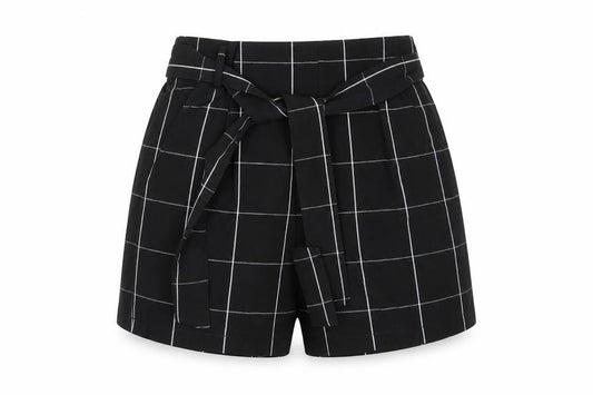 Front view of Pull&Bear women’s multicoloured check vinyl cut-off shorts, size UK 26, 6-inch leg regular