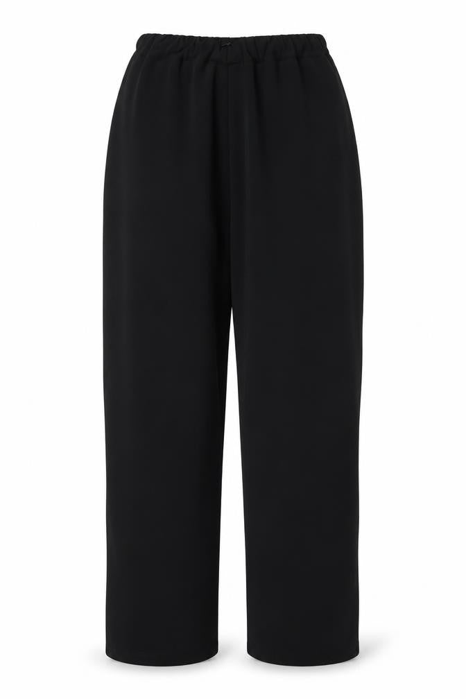 Front view of Preworn women’s black polyester trousers, size L, 25-inch leg regular