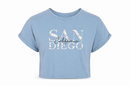 Front view of 915 Generation girls’ blue cotton cropped t-shirt, size 10-11, years crew neck