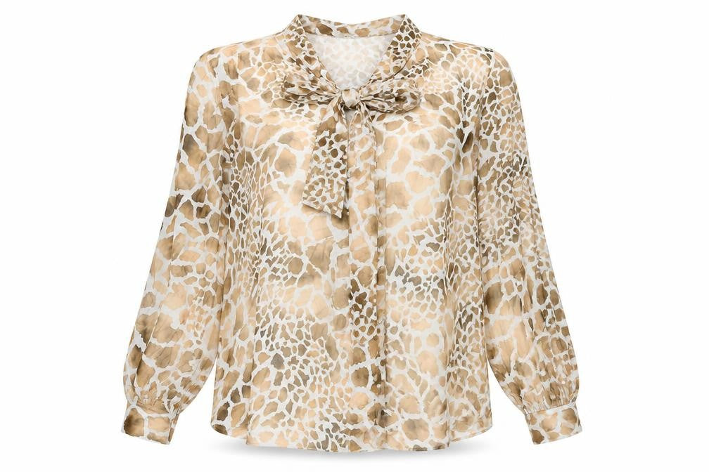 Front view of Preworn women’s beige animal print viscose basic blouse, size L, round neck