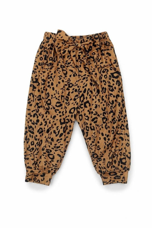 Front view of SHEIN girls’ brown animal print cotton trousers, size 12, months