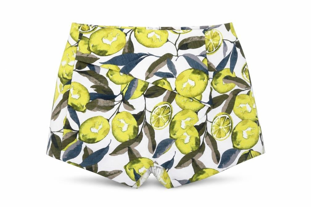 Front view of Topshop women’s white polyester hot pants shorts, size UK 8, regular - fruit print