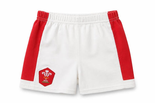 Front view of WRU boys’ white cotton cropped trousers, size 9-12, months - welsh rugby union