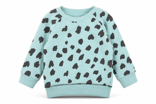 Front view of Primark girls’ blue geometric cotton jumper, size 3-6, months pullover