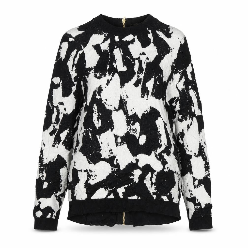 Front view of H&M women’s multicoloured round neck animal print viscose jumper, size XS