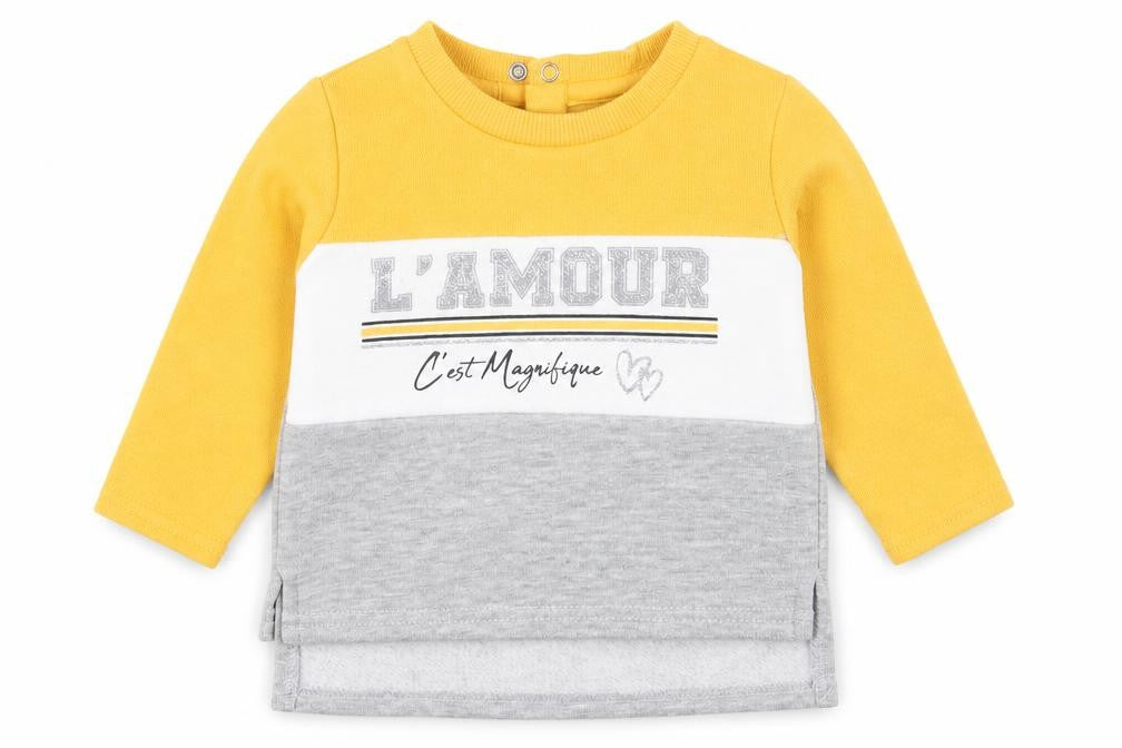 Front view of Primark girls’ yellow colourblock polyester jumper, size 6-9, months