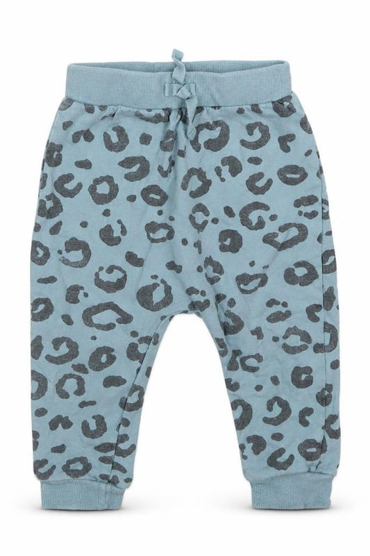 Front view of George girls’ blue animal print cotton jogger trousers, size 12-18, months tie