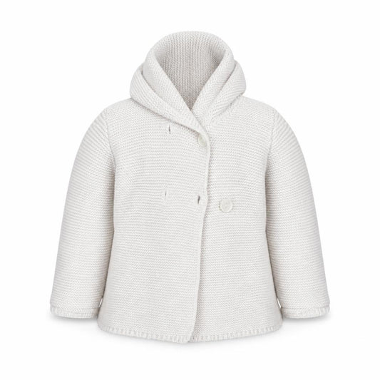 Front view of Primark girls’ white cotton cardigan jumper, size 6-9, months button