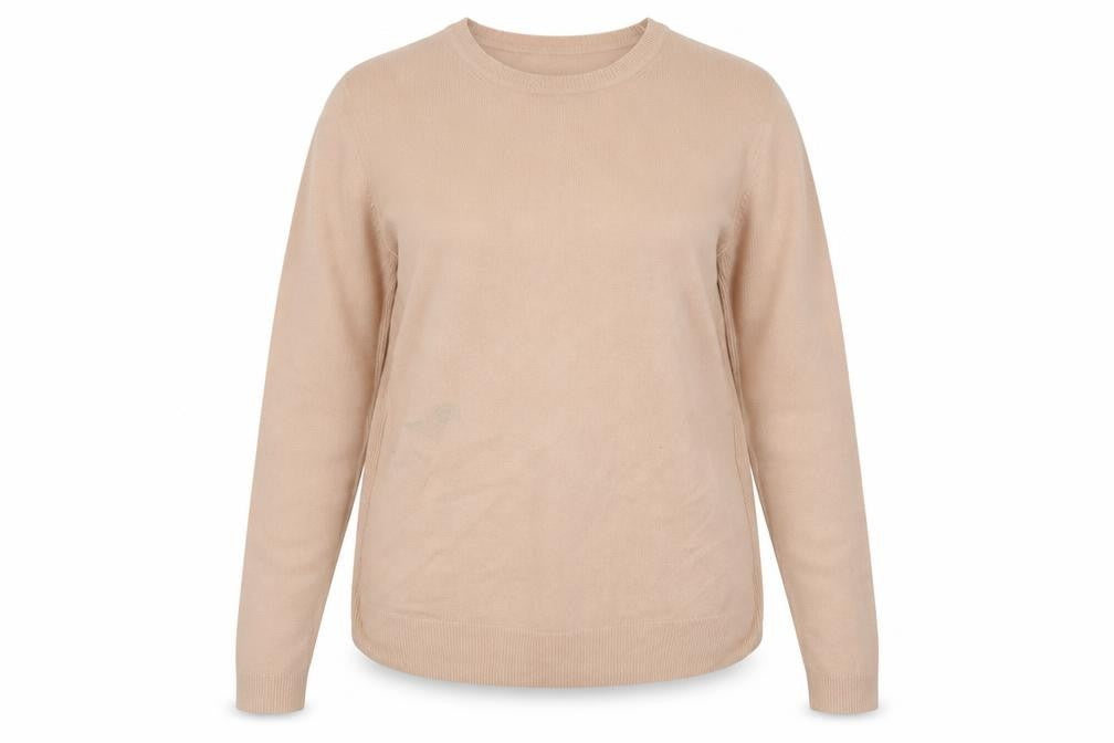 Front view of Primark women’s pink crew neck acrylic jumper, size UK 12