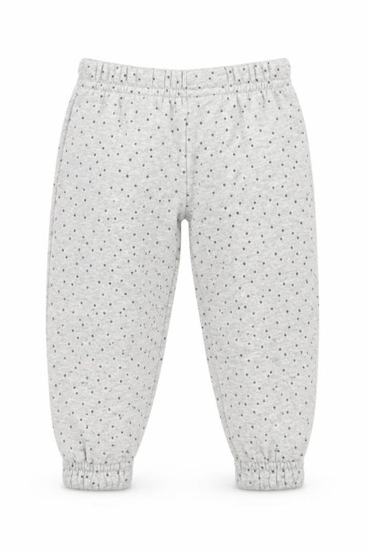 Front view of Primark girls’ grey polka dot cotton jogger trousers, size 9-12, months pullover