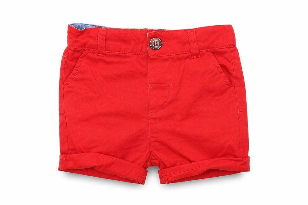 Front view of Primark boys’ red cotton cropped trousers, size 18-24, months button